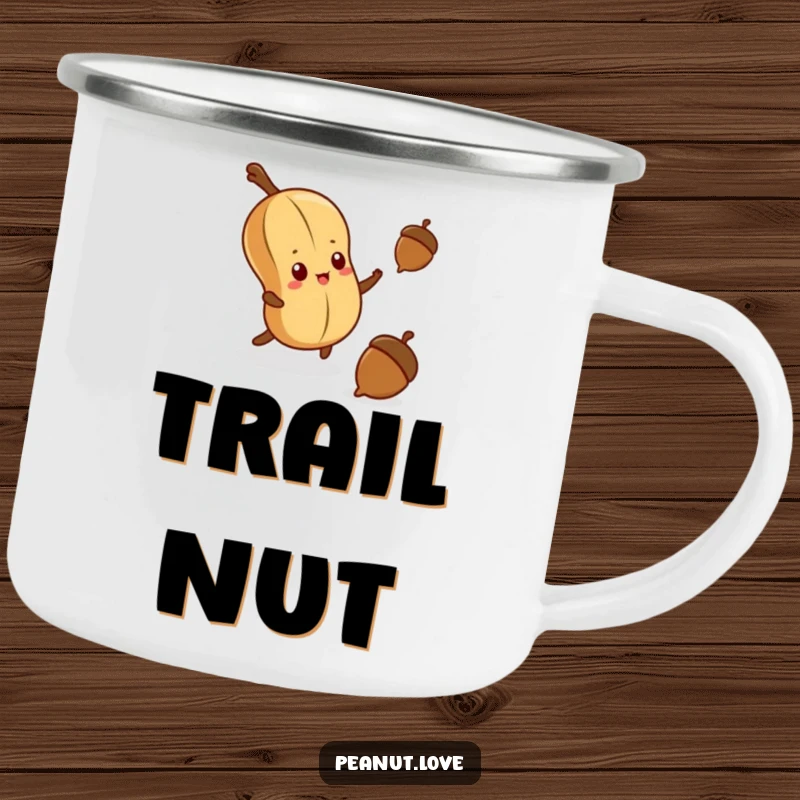 Funny camping mug showing a determined kawaii peanut reaching for a falling acorn, perfect for adventurers.