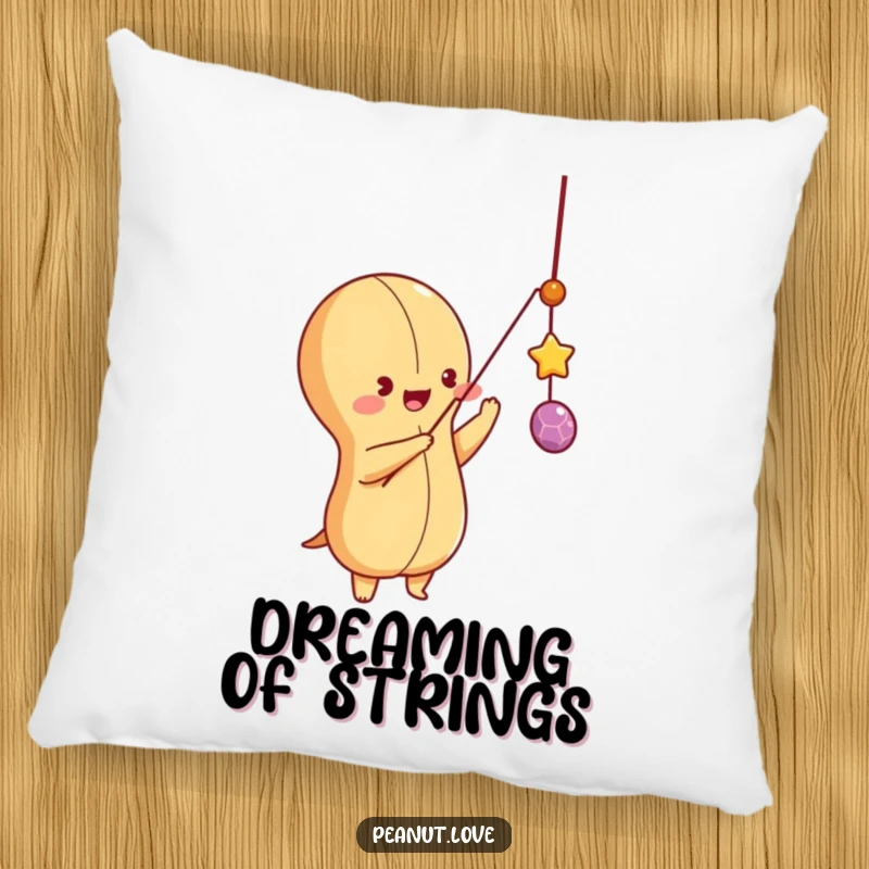 Funny peanut character batting at a dangling string with excitement, featured on a comfy pillow, playful and engaging decor.