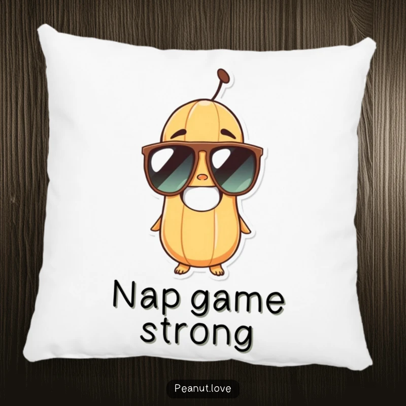 Funny peanut character wearing cool sunglasses with a wide, happy grin, depicted on a soft and decorative pillow.