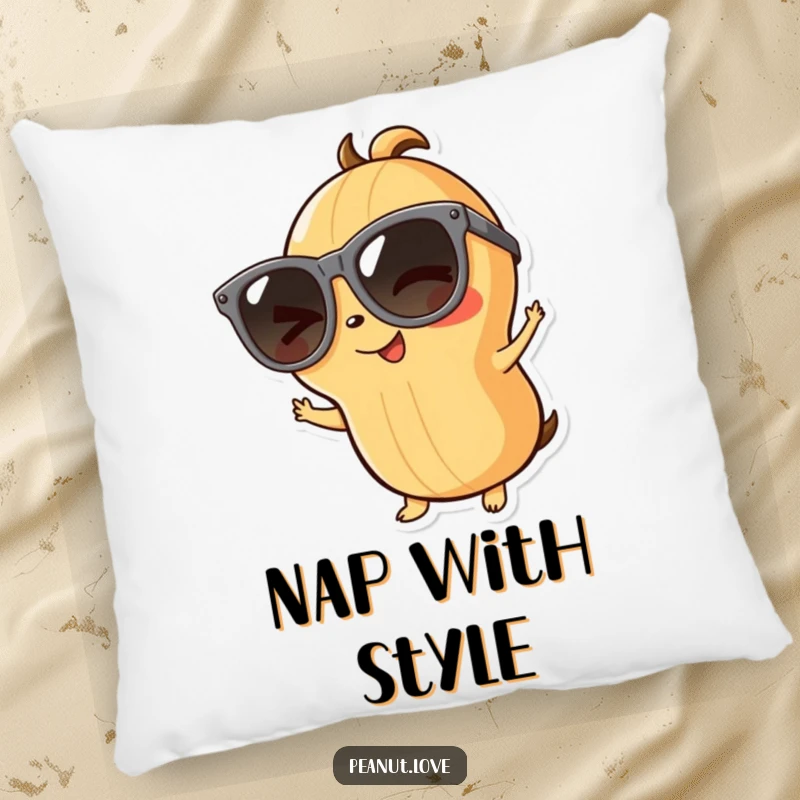 Funny playful peanut pillow featuring a winking character in large sunglasses, offering cool comfort, a snuggly funny gift.