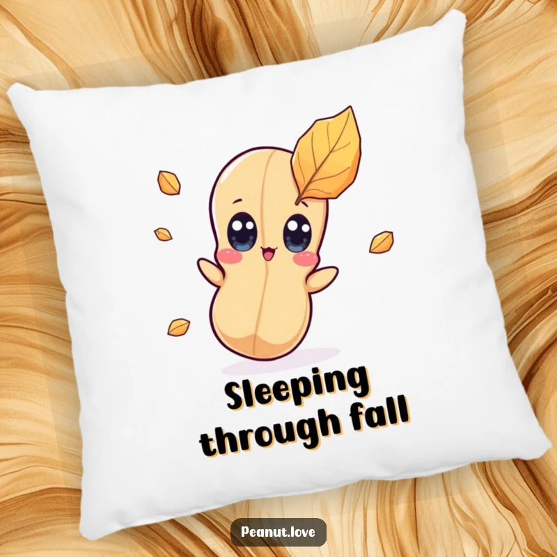 Funny kawaii peanut character pillow featuring wide eyes looking surprised by a falling leaf, perfect for cozy autumn comfort.
