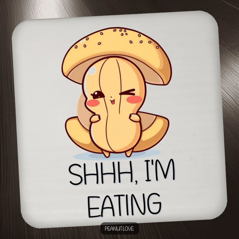 Funny Peanut Coaster: A mischievous peanut character winks playfully while hiding behind a large food item on this protective coaster.