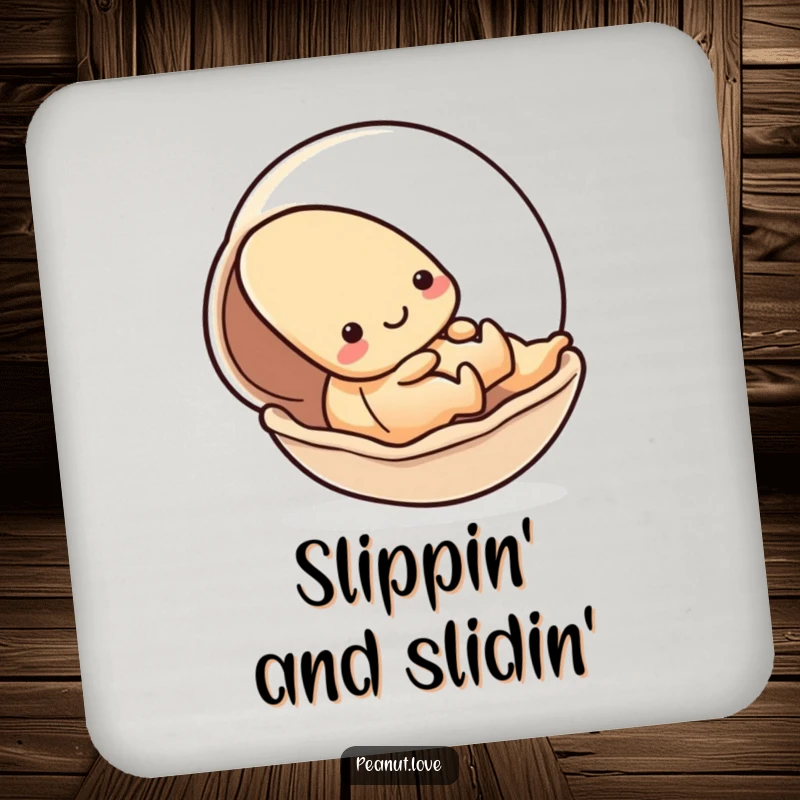 Funny coaster with a kawaii peanut character playfully sliding down a smooth shell, offering playful design for drink surfaces; a great gift.