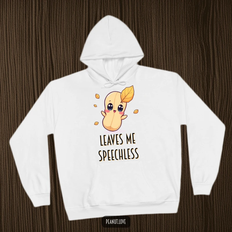 Funny kawaii peanut character hoodie depicting wide eyes looking surprised by a falling leaf, ideal for cozy autumn wear.