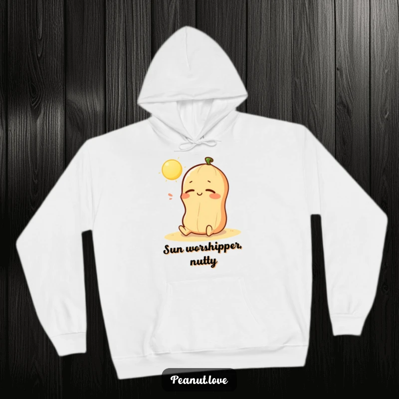 Funny hoodie depicting a kawaii peanut character happily sunbathing with closed eyes and a sigh, offering cozy relaxation; ideal for gifting.