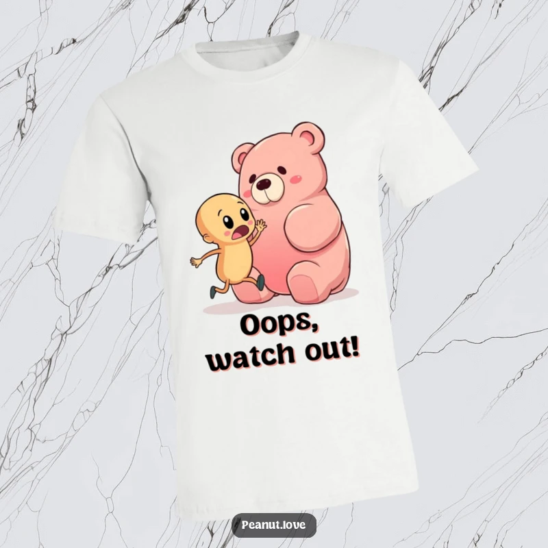 Funny t-shirt featuring a startled peanut character comically stumbling over a massive gummy bear, perfect for anyone who enjoys slapstick humor.