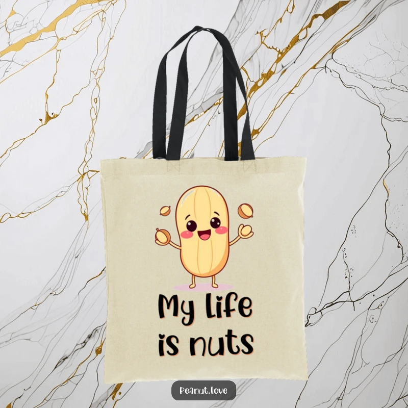Funny tote bag with a cute kawaii peanut grinning while juggling three small nuts, symbolizing fun and dexterity.