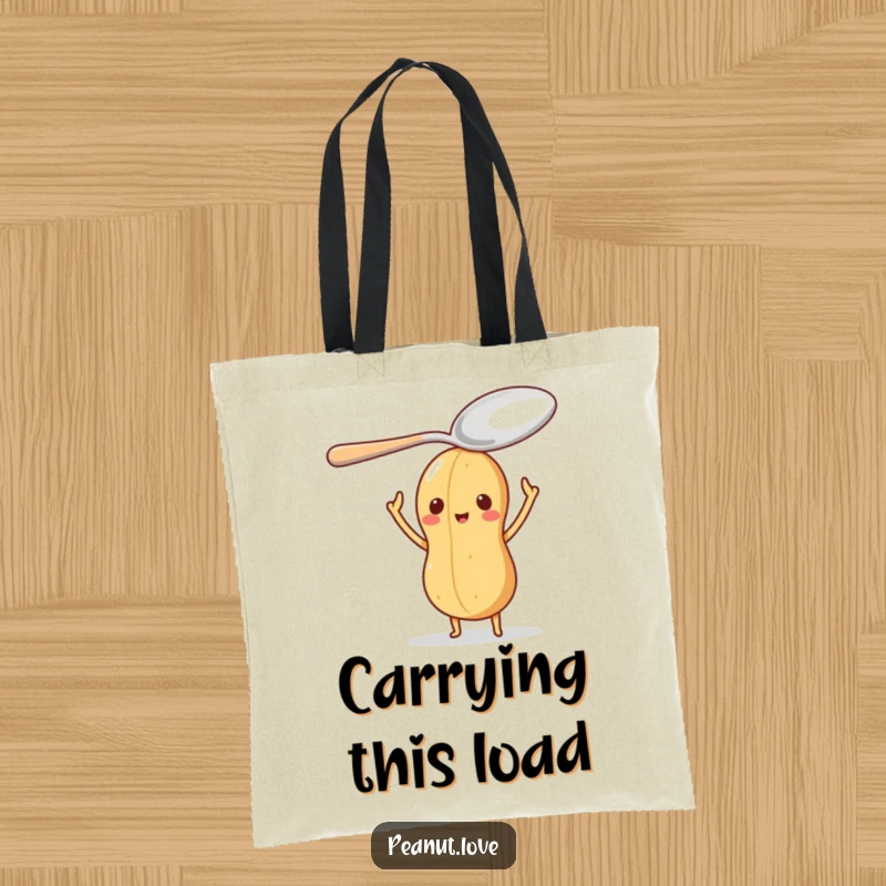 Funny tote bag with a little peanut character balancing a huge spoon on its head, showcasing a funny balancing act.